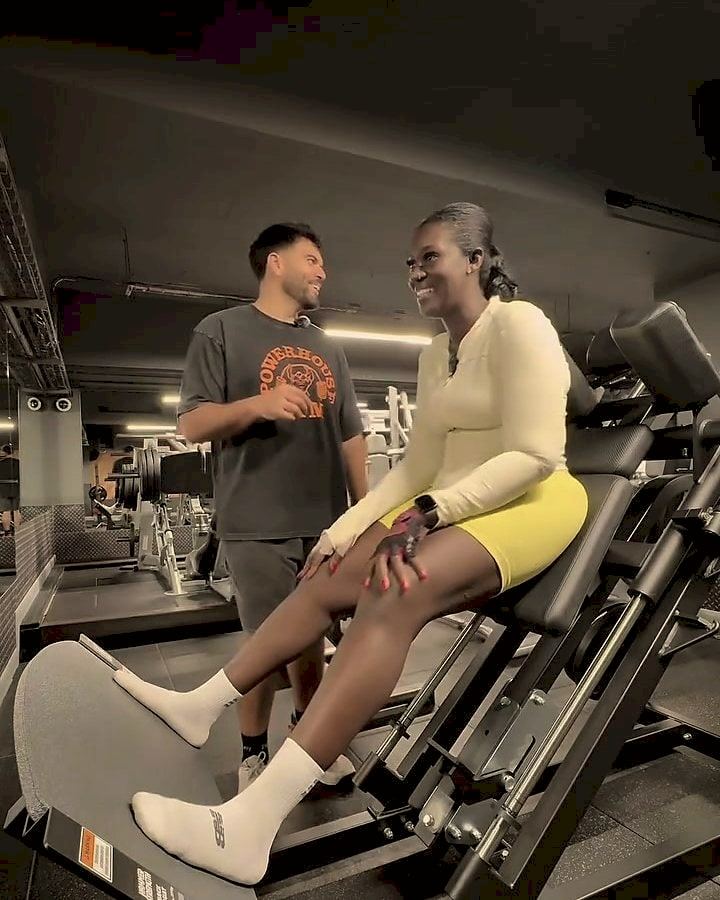 Nacks laughing with Pablo between sets on the leg press.